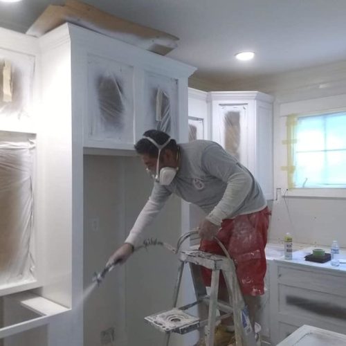 interior painting of a man using smoke mask