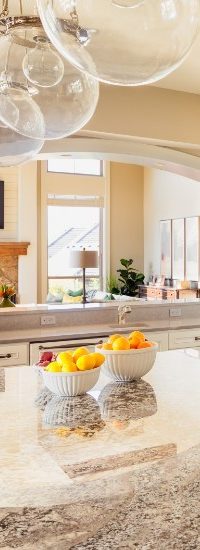 a elegant kitchen with fruits in the table